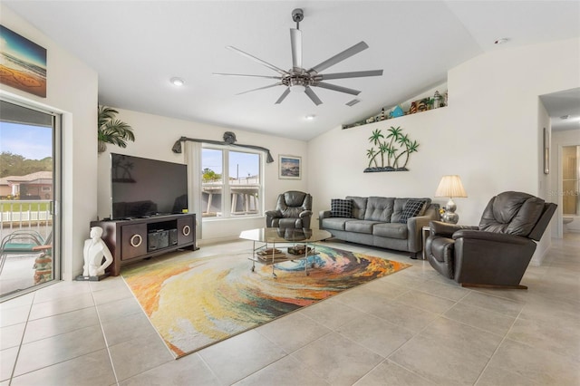 38 Colechester Ln, Palm Coast, FL 32137 - living area with a ceiling fan, vaulted ceiling, and tile patterned floors