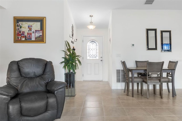 38 Colechester Ln, Palm Coast, FL 32137 - entrance foyer featuring light tile patterned flooring and baseboards