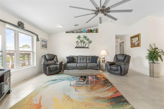 38 Colechester Ln, Palm Coast, FL 32137 - living room with light tile patterned floors, lofted ceiling, and a ceiling fan