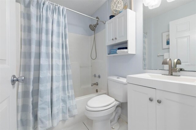 full bathroom with toilet, shower / tub combo, vanity, and tile patterned floors