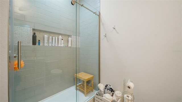 bathroom featuring an enclosed shower