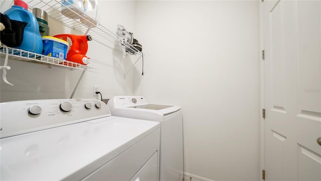 washroom with washer and clothes dryer