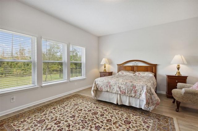 bedroom featuring light hardwood / wood-style floors