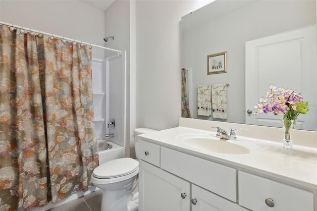 full bathroom featuring toilet, vanity, tile patterned floors, and shower / tub combo with curtain