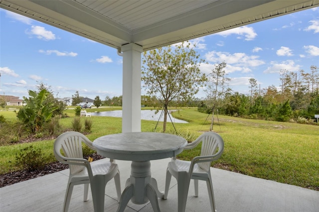 view of patio / terrace with a water view