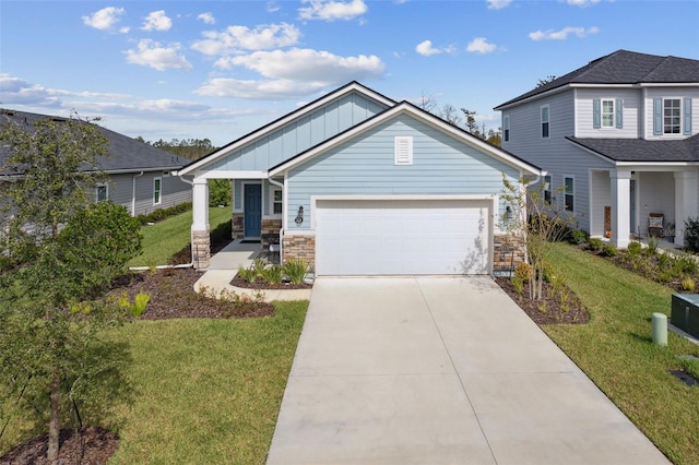 view of front of house featuring a garage, a porch, and a front lawn