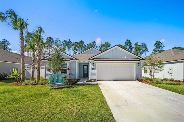 ranch-style house featuring a front yard and a garage