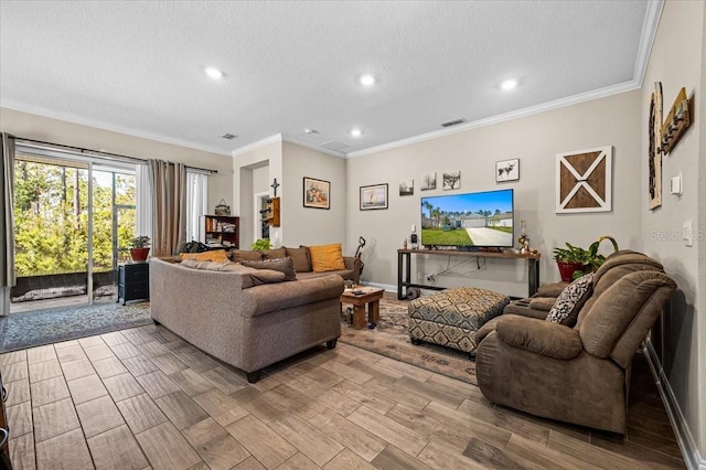 living room featuring crown molding, a textured ceiling, and light hardwood / wood-style floors