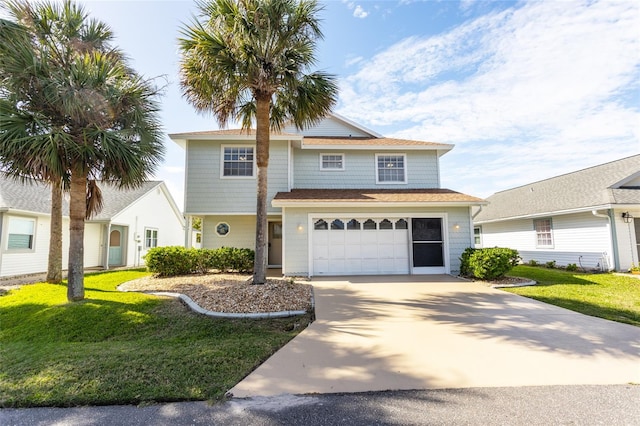 view of front of house with a garage and a front lawn