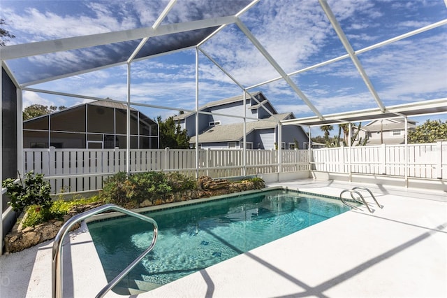 view of pool featuring a patio and a lanai