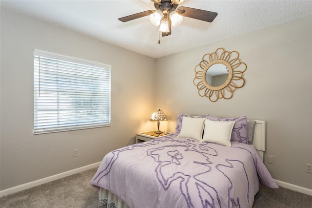 bedroom featuring ceiling fan and carpet floors