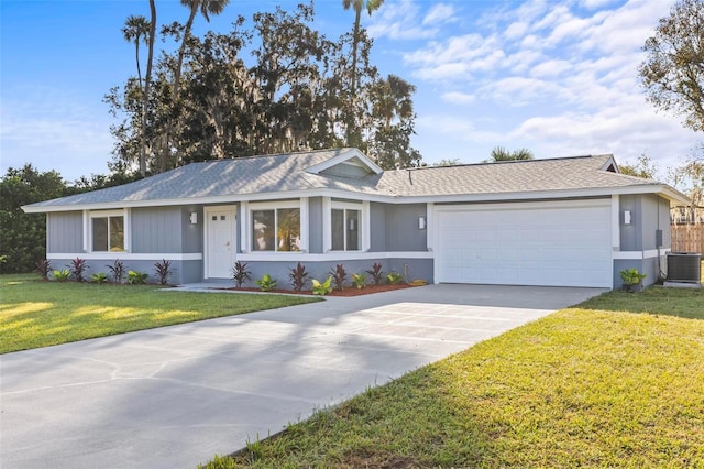 ranch-style home featuring central AC, a front yard, and a garage