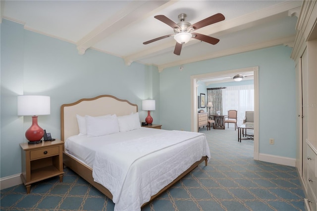 bedroom with ceiling fan, beam ceiling, carpet flooring, and crown molding