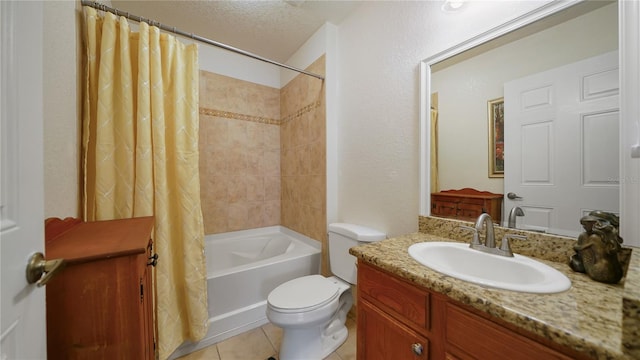 full bathroom with vanity, a textured ceiling, tile patterned flooring, toilet, and shower / bathtub combination with curtain