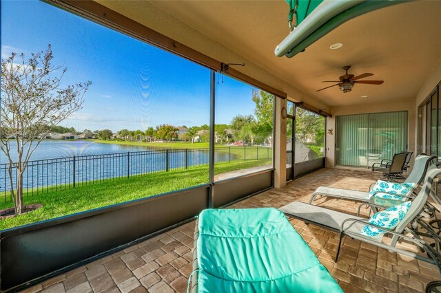 472 Los Caminos St, Saint Augustine, FL 32095 - sunroom / solarium featuring a ceiling fan and a water view