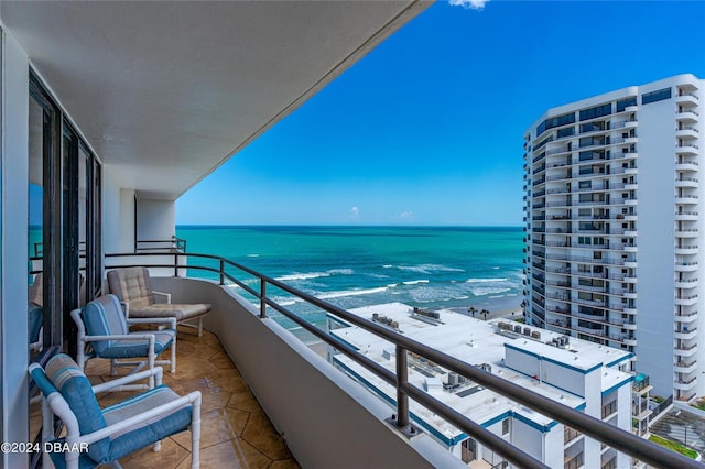 balcony featuring a water view