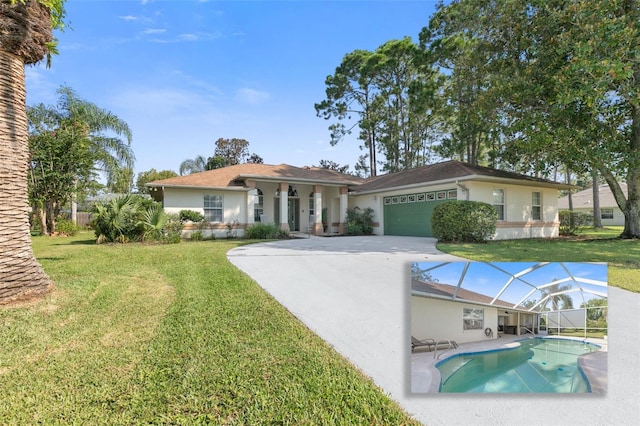 view of front of property with a garage and a front lawn