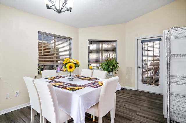 50 Florida Park Dr, Palm Coast, FL 32137 - dining room with dark wood finished floors and a chandelier
