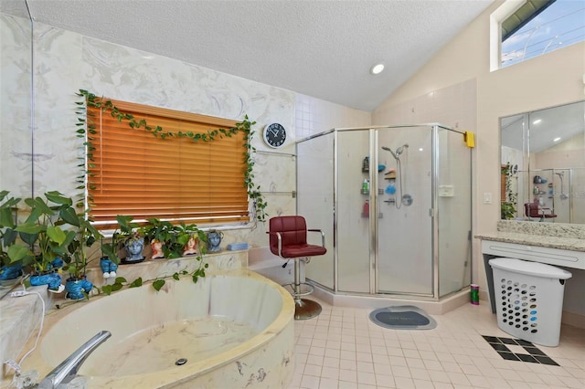 bathroom featuring tile patterned flooring, lofted ceiling, a textured ceiling, and independent shower and bath