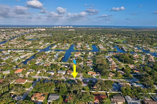 50 Florida Park Dr, Palm Coast, FL 32137 - aerial view of property and surrounding area featuring a large body of water and nearby suburban area