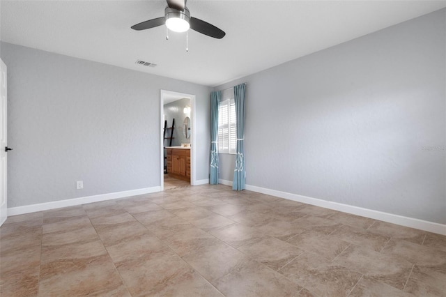 empty room featuring ceiling fan