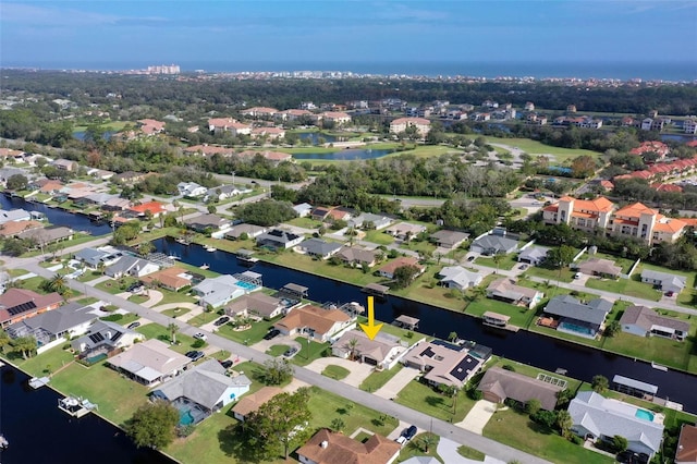 bird's eye view with a water view