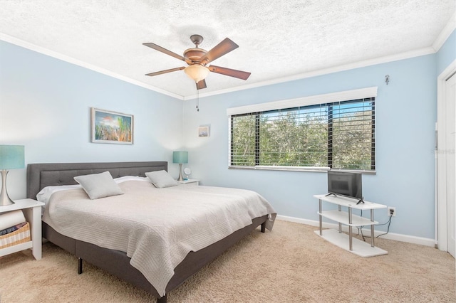 bedroom featuring ceiling fan, crown molding, light colored carpet, and a textured ceiling