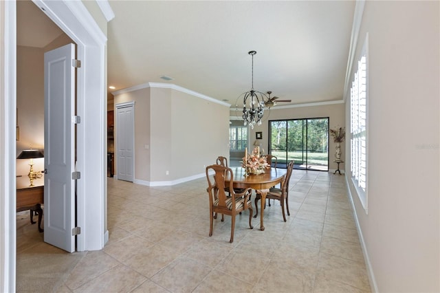 tiled dining space featuring a notable chandelier and crown molding