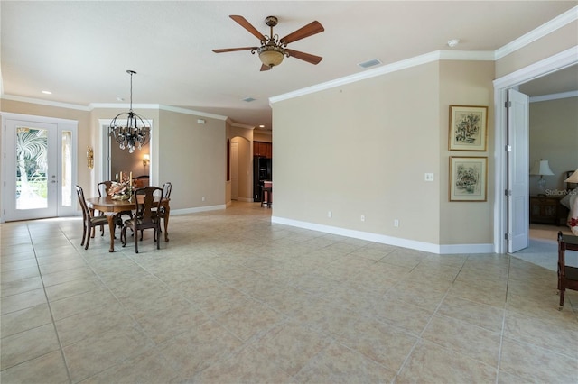 dining area with ceiling fan with notable chandelier and crown molding