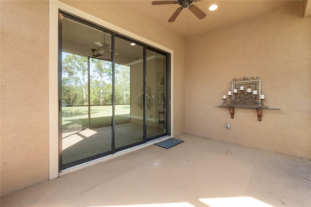 exterior space with a patio area and ceiling fan