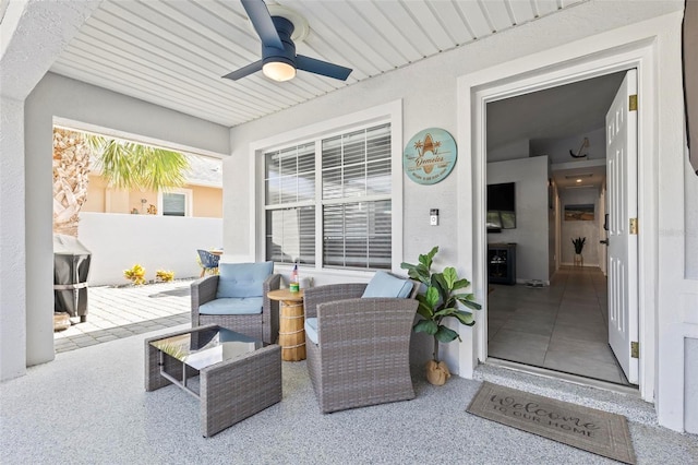 view of patio / terrace featuring an outdoor living space and ceiling fan