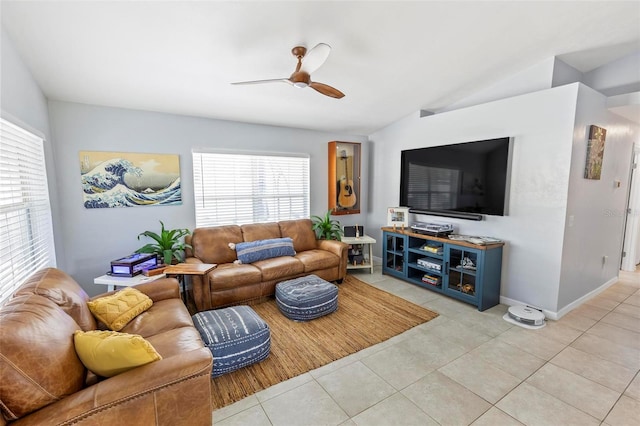 tiled living room featuring lofted ceiling and ceiling fan