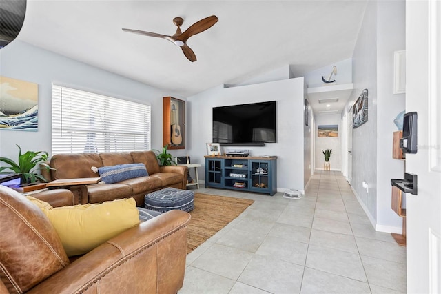 tiled living room with lofted ceiling and ceiling fan