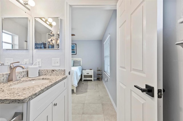 bathroom with vanity and tile patterned flooring