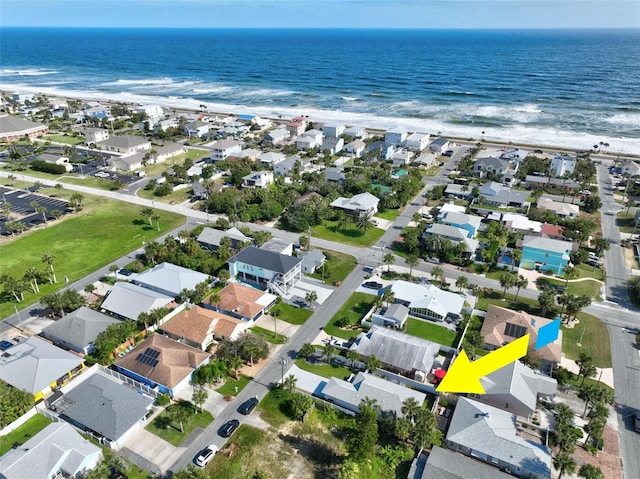 aerial view with a beach view and a water view