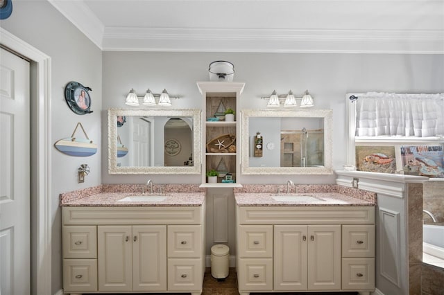 bathroom with two vanities, a sink, and crown molding