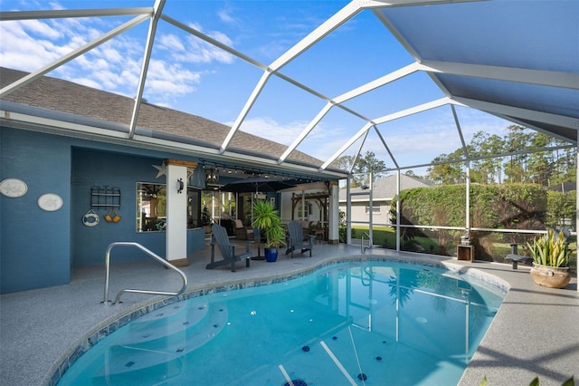 pool featuring a lanai and a patio