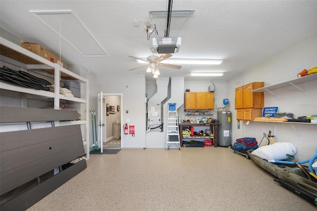 garage featuring a garage door opener, electric water heater, and ceiling fan