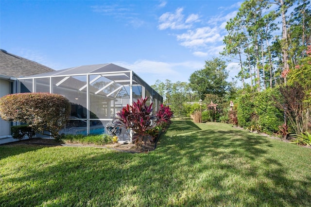 view of yard featuring a lanai