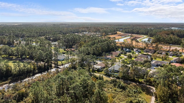 bird's eye view with a view of trees