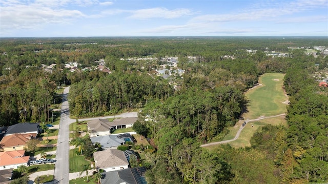 aerial view with a residential view and a view of trees