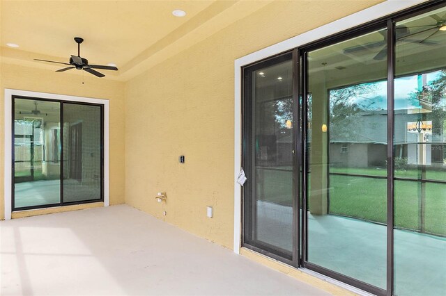 view of patio / terrace featuring ceiling fan