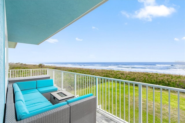7095 N Ocean Shore Blvd, Palm Coast, FL 32137 - balcony featuring an outdoor living space with a fire pit and a water view