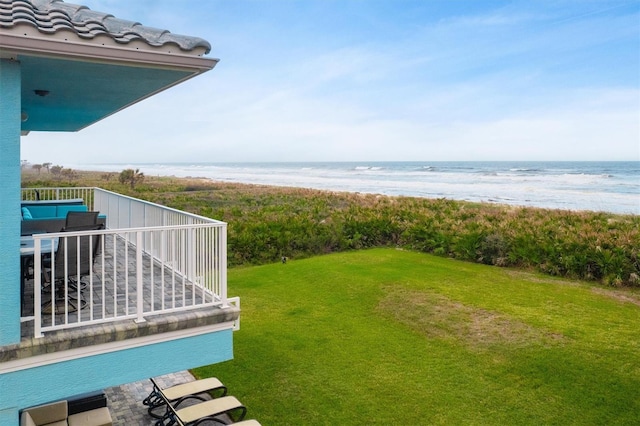 7095 N Ocean Shore Blvd, Palm Coast, FL 32137 - view of grassy yard featuring view of water and beach and stairs