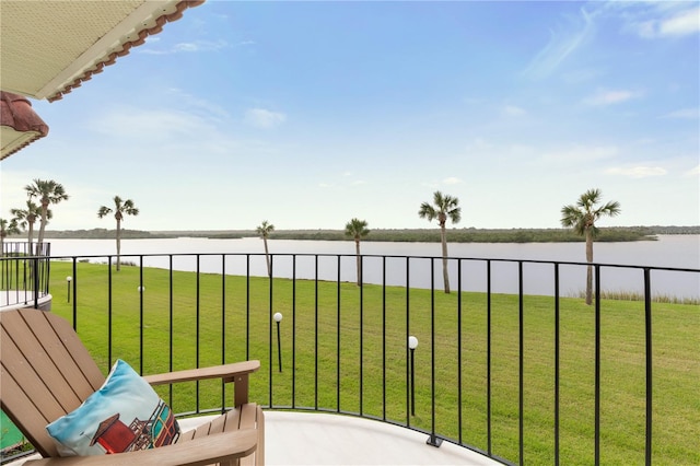 balcony featuring a water view