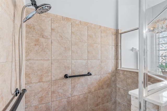 details with a tile shower