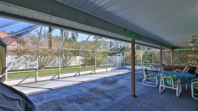 view of patio / terrace with glass enclosure and ceiling fan