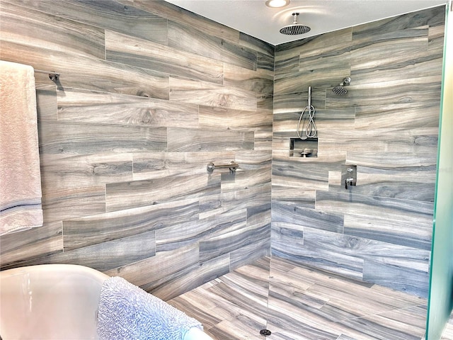 bathroom with shower with separate bathtub