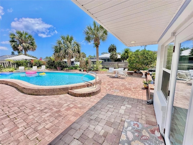 view of pool with a patio area