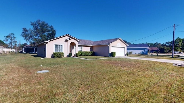 ranch-style home featuring a front yard and a garage